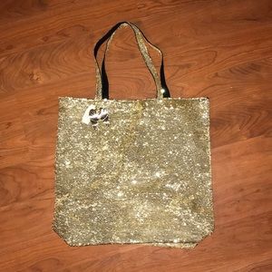 Gold sequined Victoria’s Secret tote bag